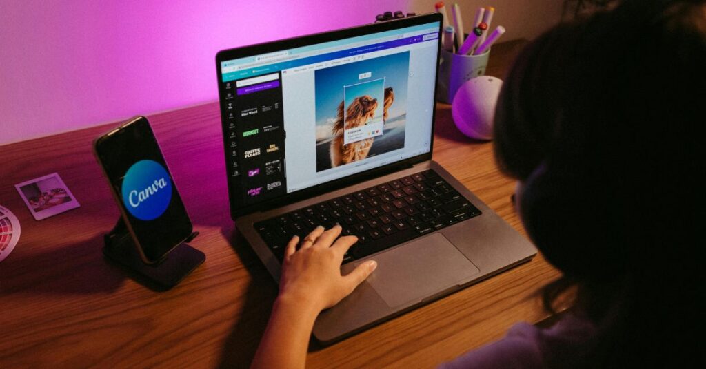 Student using Canva free design 
tool for startup branding in 2026